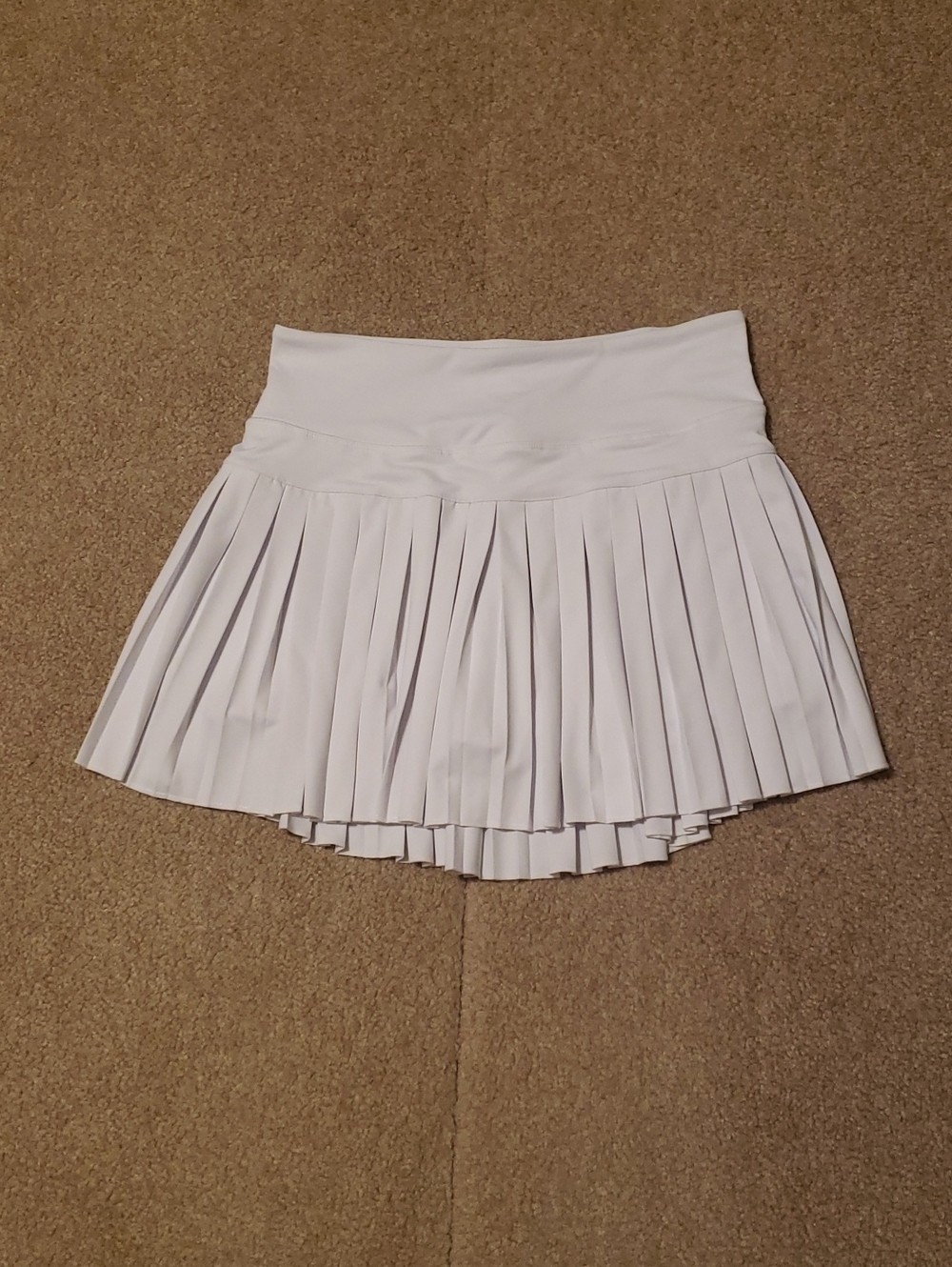 Gold Hinge Women's White Pleated Tennis Skort.